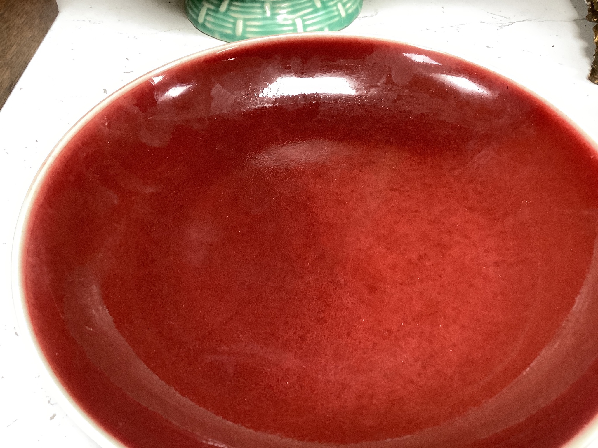 A Chinese sang de boeuf glazed dish, 22cm